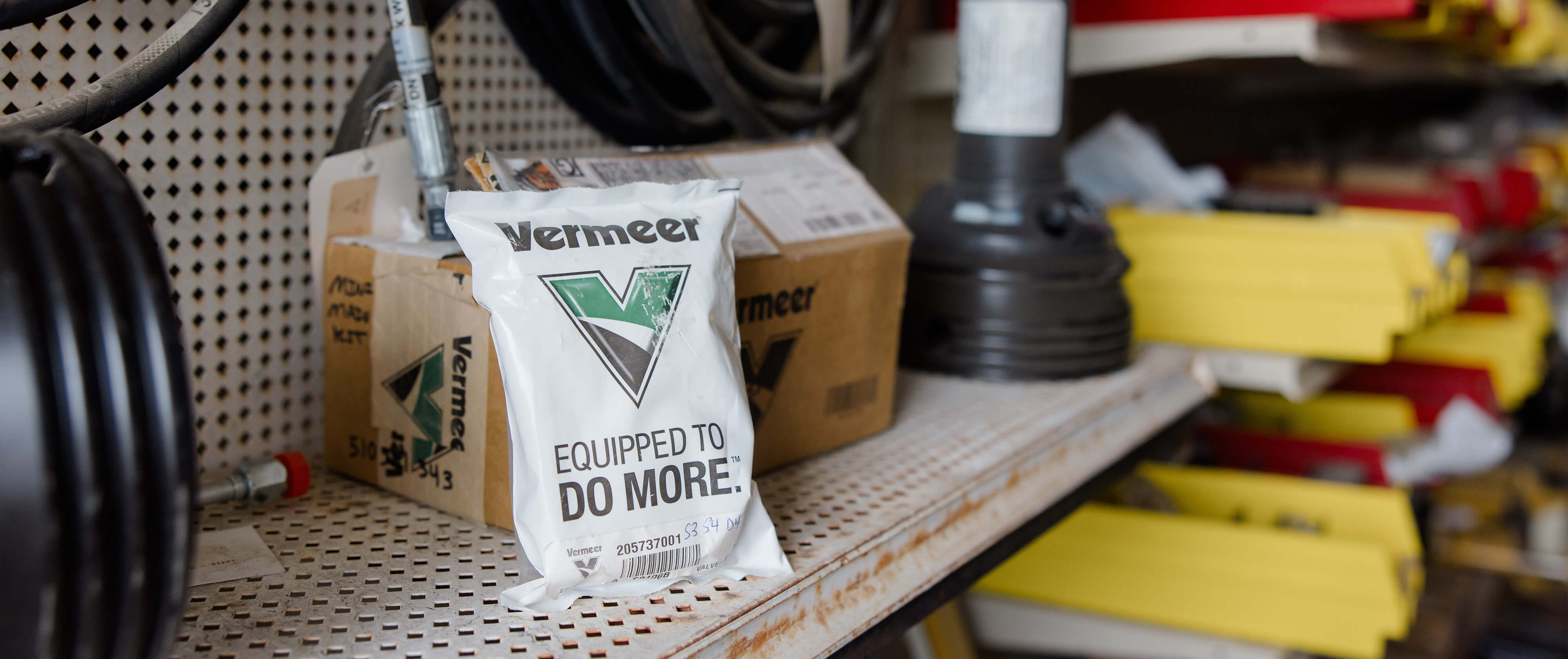 Vermeer parts in a bag that reads Veermer, Equipped to do more.