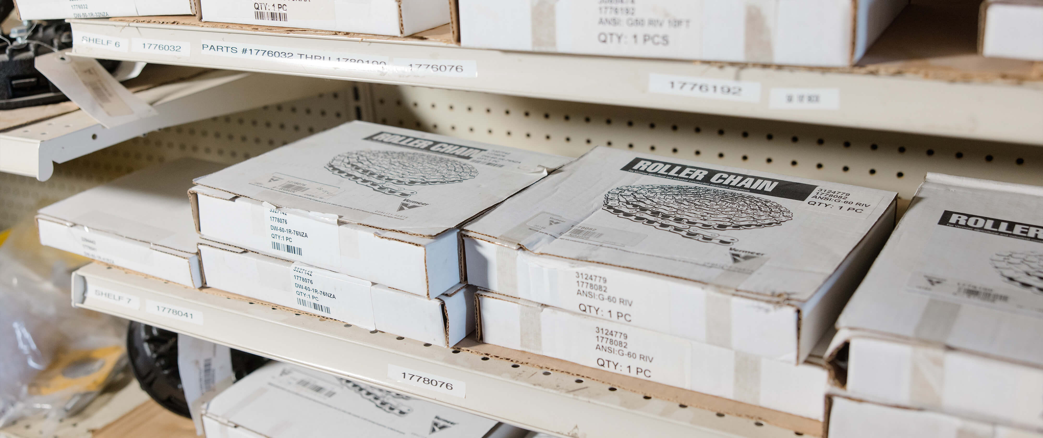 Shelves of roller chain boxes on a shelf