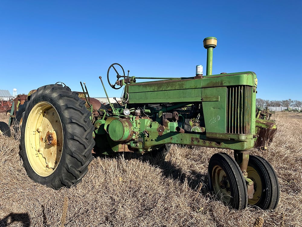 Green Salvaged tractor with the label 620