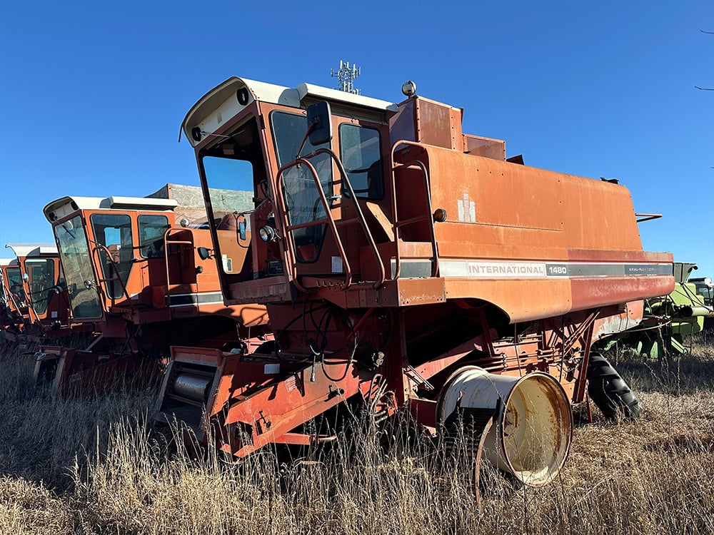 red salvaged Case IH International 1480 harvester