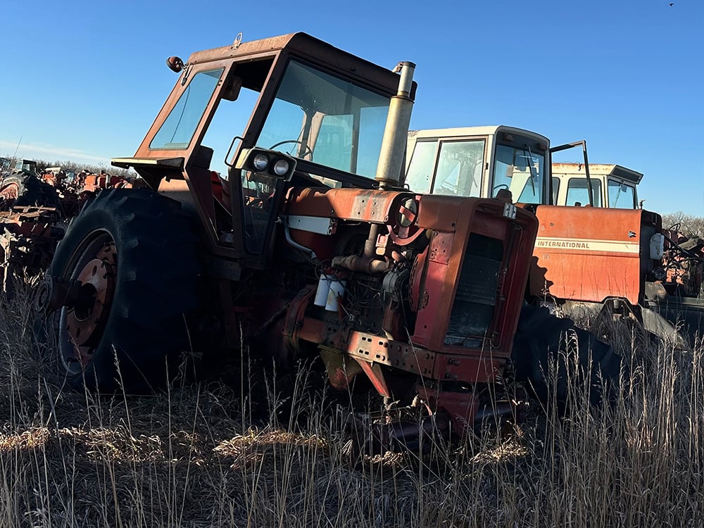 International tractors in a row and taken apart