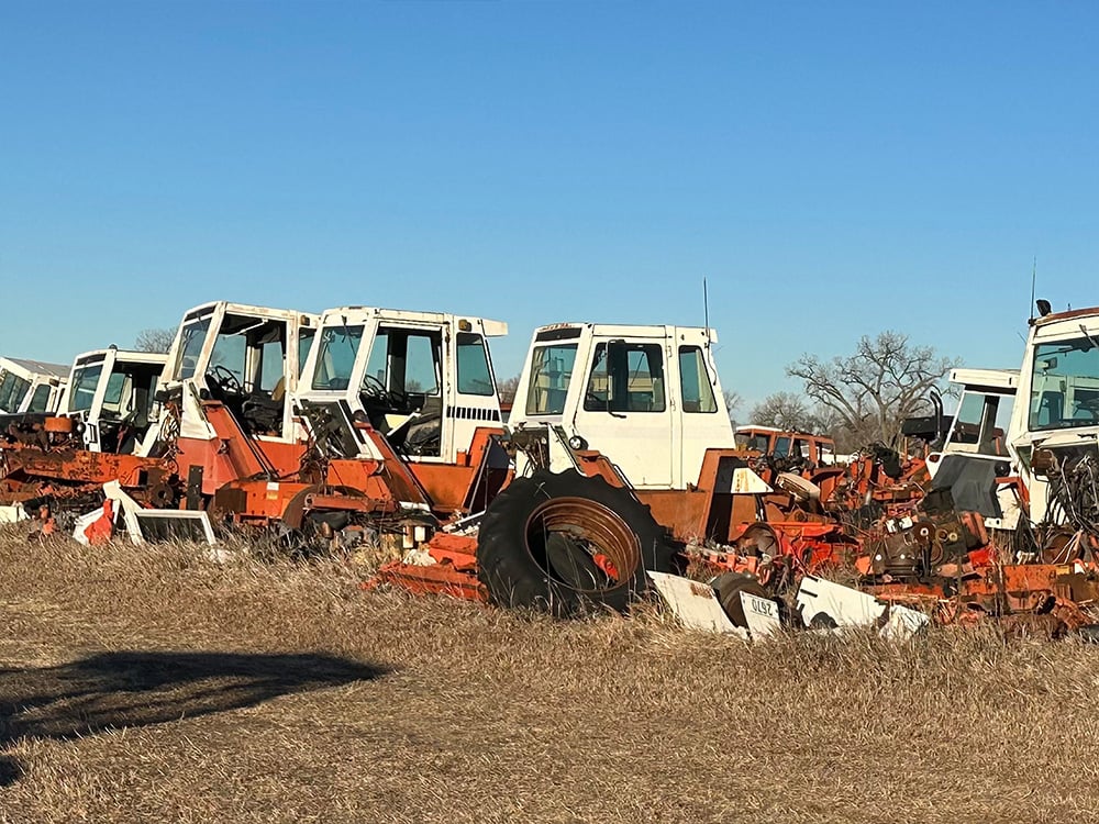 Rows of white and orange tractor tops on display